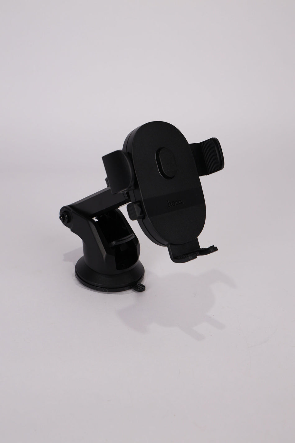 Car Mobile Holder HOCO-H19 – Equipped with suction and double-sided adhesive for strong and secure mounting. Practical design compatible with all smartphones, perfect for GPS and hands-free calls while driving safely and comfortably – Black